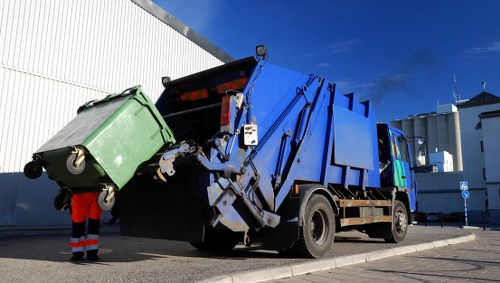 Bulky waste being loaded for removal in Hornsey