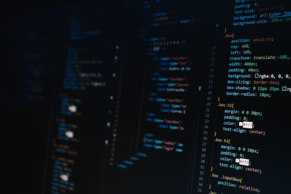 Close-up view of a computer screen displaying lines of HTML and CSS code in a dark-themed editor window. The text is highlighted in various colors, including blue, yellow, and white, indicating differ